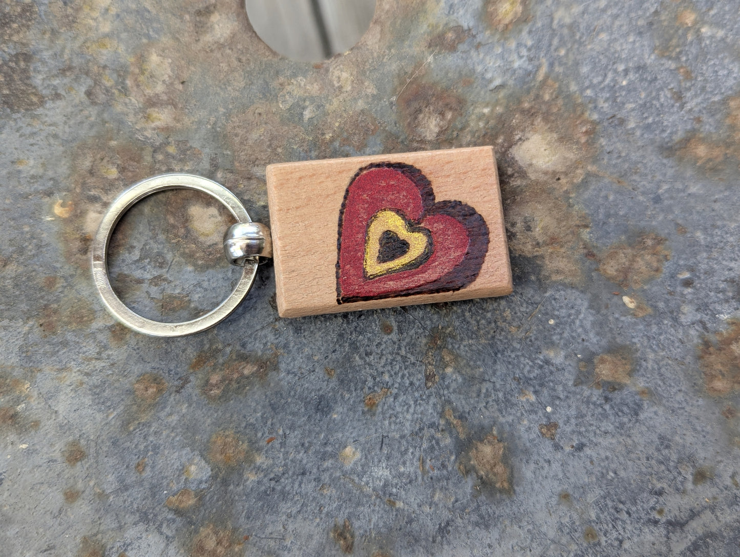 Handcrafted Pyrography Heart Keychain – With a Touch of Color
