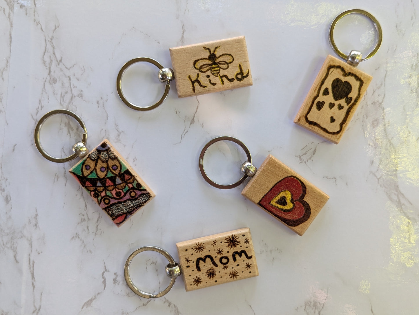 Handcrafted Pyrography Heart Keychain – With a Touch of Color