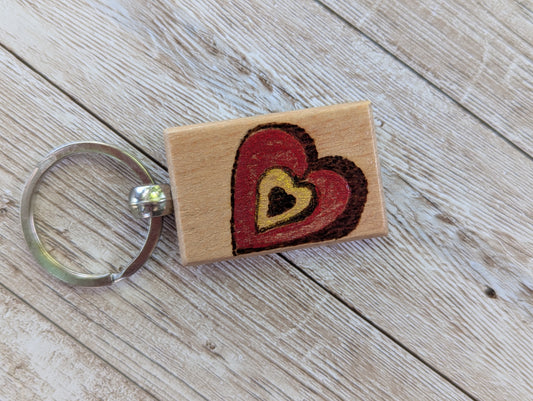 Handcrafted Pyrography Heart Keychain – With a Touch of Color