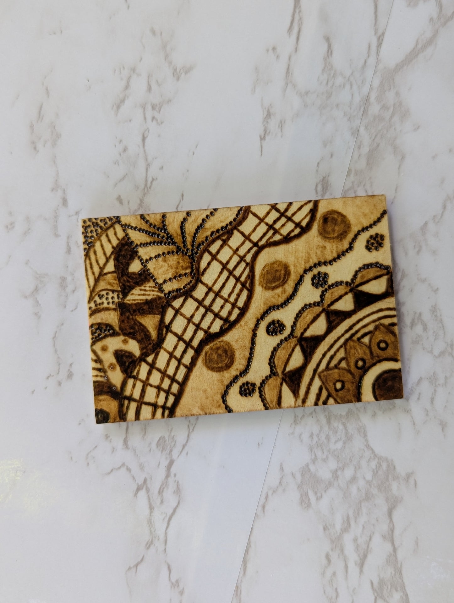 Handcrafted Mandala Pyrography Magnet – 2x3 Inches of Artistic Serenity